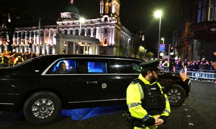 Joe Biden is greeted by supporters as he drives through Belfast.