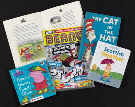 A display of a Beano magazine, The Cat in the Hat, Peppa's Muddy Puddle Walk and Scottish Weather and My First Scottish Weather