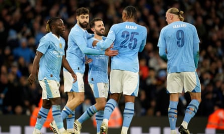 Bernardo Silva is congratulated by his teammates after his second goal for Manchester City against Newcastle.