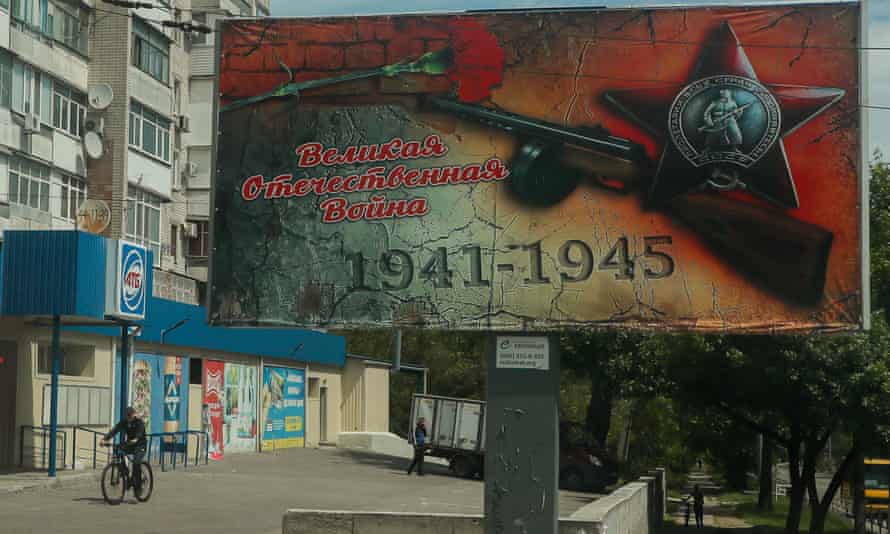 A picture taken during a media tour organised by the Russian army shows a poster reading ‘Great Patriotic War 1941-1945’, in Kherson.