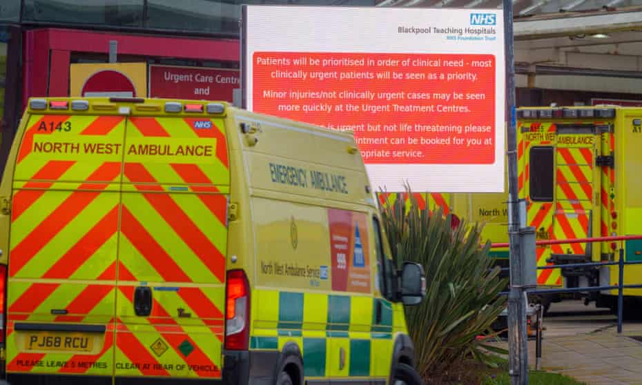 A digital sign displays current waiting times outside Blackpool Victoria hospital caused by staff shortages.