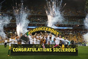 The Socceroos celebrate their achievement.
