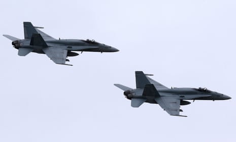 Canadian fighter jets during a Nato flyover in Romania. Canada will reportedly send 1,000 soldiers in Latvia.