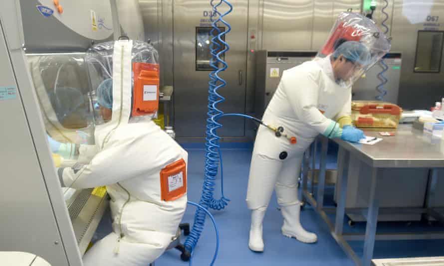 An image issued on 16 April 2020 of researchers working in a lab at the Wuhan Institute of Virology in February 2017