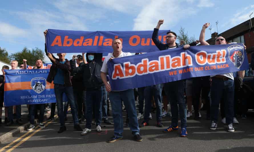 Supporters protest against Oldham Athletic’s owner Abdallah Lemsagam
