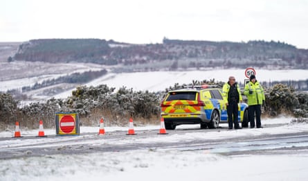 Police close the A171 road near Birk Brow after a collision during snowfall