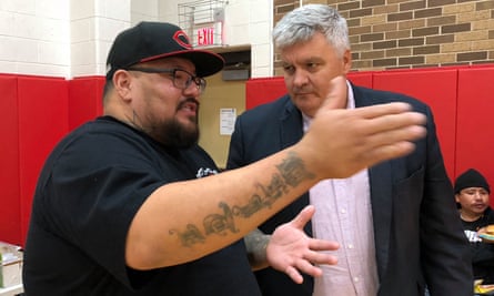 Chris White Eagle, left, gestures while speaking with Pennington county state’s attorney Mark Vargo at a Lakota cultural celebration sponsored by White Eagle’s youth empowerment program.
