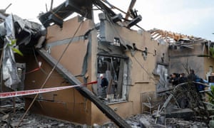 The house hit by a rocket in Mishmeret, north of Tel Aviv on Monday. Six people were injured.