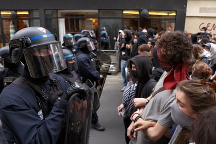 Police and students face off outside Sciences Po in Paris.