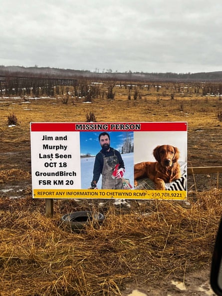A missing person billboard showing pictures of a man and a dog