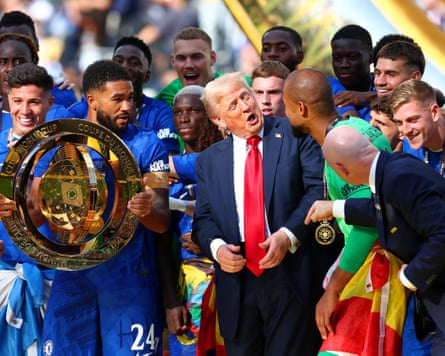 US president Donald Trump puts himself centre stage at the Club World Cup final, as bemused Chelsea players look on