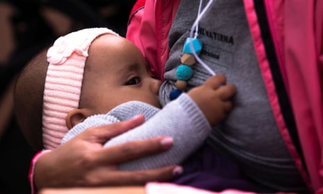 A woman breastfeeding her baby in Mexico City, Mexico, August 2022