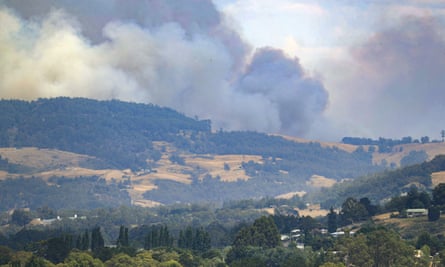 Smoke billows from a bushfire south of Huonville in southern Tasmania