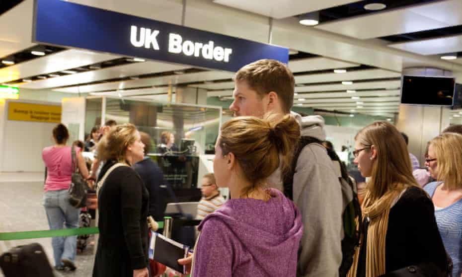People at UK border control at Heathrow airport.
