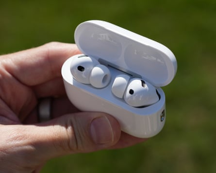 The AirPods Pro 3 in their charging case with the lid open.