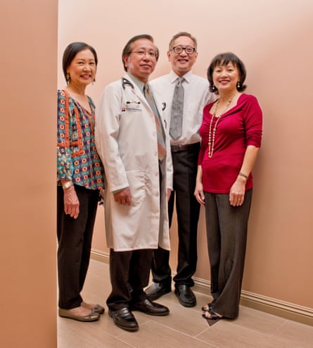 Back to business: Dr Hung Nguyen, who now lives and works in Los Angeles, with his family.