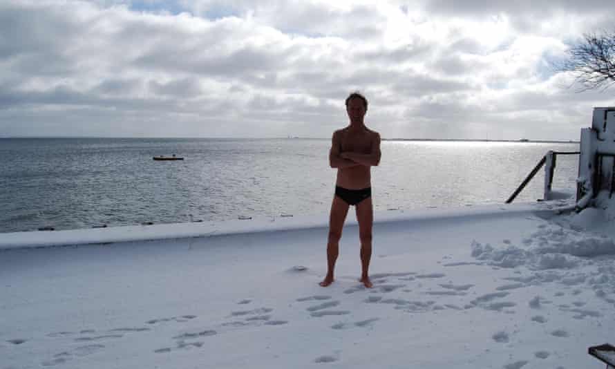 The author preparing to swim at Provincetown, Massachusetts, in winter.