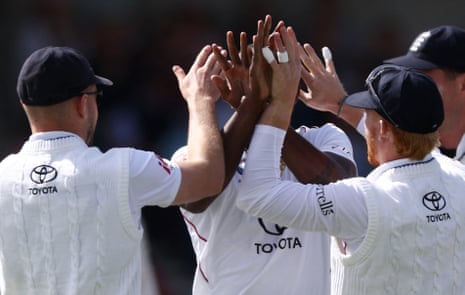 England's Jofra Archer celebrates with teammates after taking the wicket of Pakistan's Imam-ul-Haq caught out by England's Jamie Smith.