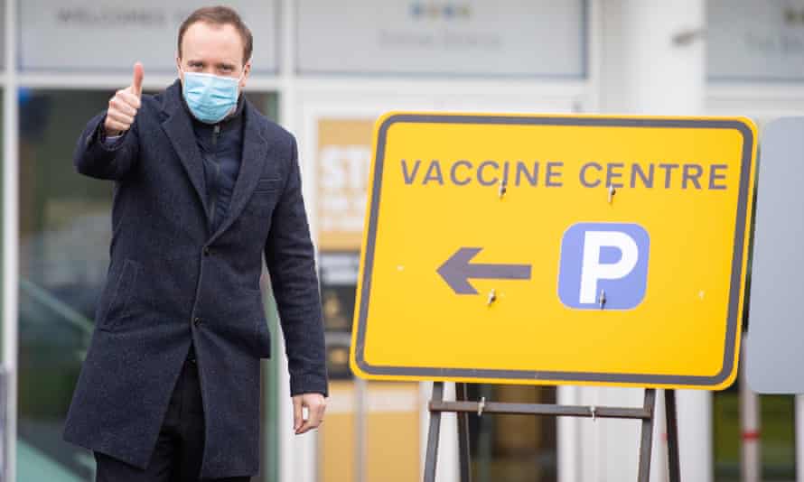 Matt Hancock wearing a zip-up top at a vaccination centre