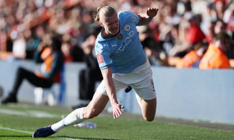 Erling Haaland takes a painful fall during Manchester City’s FA Cup win at Bournemouth
