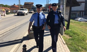 Svetlana Kapetanović, with her colleague Isak Hertica, has learned Alabanian to help her better police the town of Gračanica.