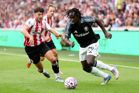 Evann Guessand (right) goes at Brentford’s Aaron Hickey during a lively showing.