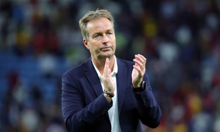 Kasper Hjulmand applauds fans after the defeat to Australia.