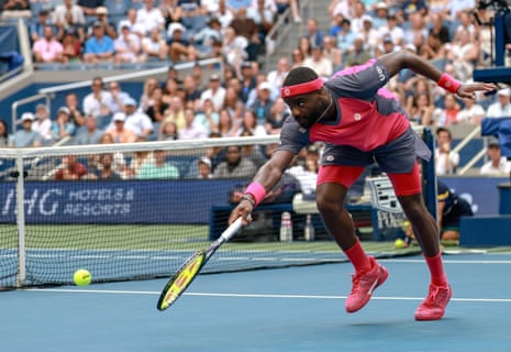 Frances Tiafoe stretches for a return on his way to squaring the match in his quarter-final against Alex Michelsen.
