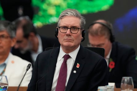 Keir Starmer listening intently at a meeting
