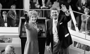 President Ronald Reagan and first lady Nancy Reagan wave to onlookers at the capitol building in Washington following the swearing in ceremony of 1981. 