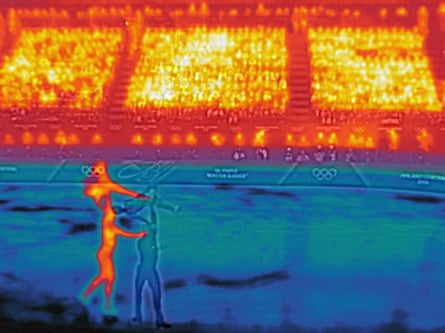 Ellie Kam and partner Danny O’Shea of the USA compete in the pairs free skating team event at Milano Ice Skating Arena.