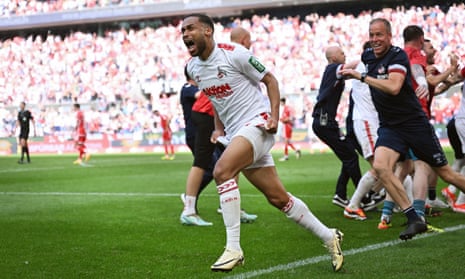 Linton Maina celebrates at the end of the 3-2 win against Union Berlin that gave Köln hope of Bundesliga survival.