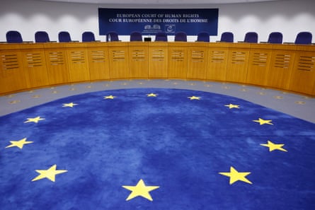 a court with a blue carpet with yellow stars on it