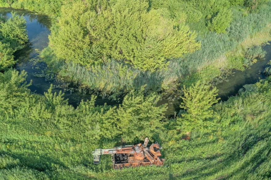 A rusting Russian engineering vehicle lies abandoned near Rakivka, where Ukrainian troops attacked and blocked a pontoon crossing.