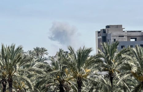 Smoke rises from the northern part of Nuseirat refugee camp after an attack by the Israeli army on Friday in Deir al-Balah, Gaza.