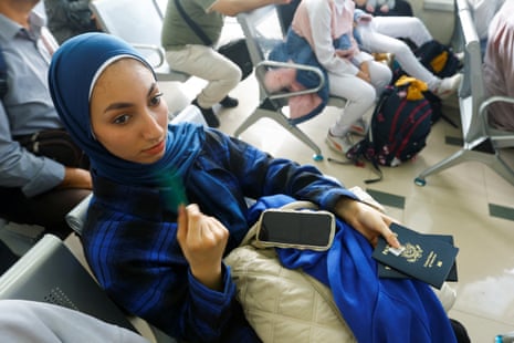 A Palestinian woman holding a US passport waits for permission to leave Gaza at the Rafah border crossing with Egypt on Thursday.