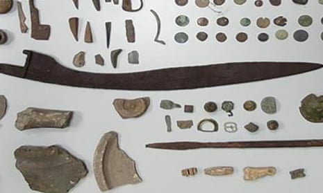 Detail of a Spanish police picture of the sword and other archaeological pieces