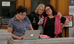 Cosby accuser Victoria Valentino and a supporter during deliberations in the Montgomery County courthouse.