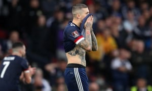 Lyndon Dykes of Scotland reacts after missing a penalty.