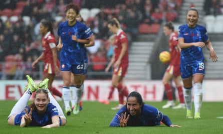 Mayra Ramirez celebrates with Sjoeke Nüsken after scoring Chelsea’s first goal in the 3-0 win at Liverpool