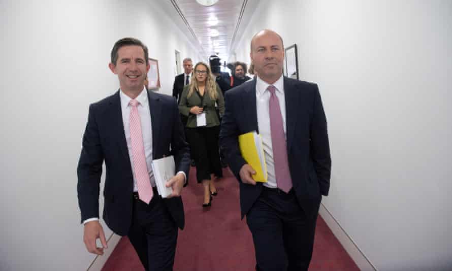 Treasurer Josh Frydenberg and finance minister Simon Birmingham arrive in the press gallery budget lock up on Tuesday.