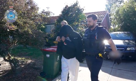 A recently freed detainee from immigration detention being arrested after allegedly assaulting a 73-year-old Perth woman during a violent home invasion