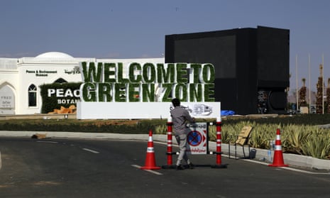 A worker prepares the entrance to the "green zone" before the UN’s global summit on the climate crisis in Sharm el-Sheikh, Egypt.