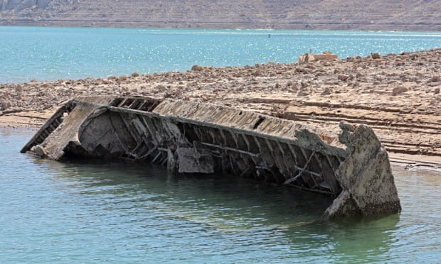 The boat was used to survey the Colorado River decades ago and is now coming to surface due to receding lake water.