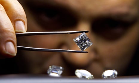An expert examines a diamond in Antwerp