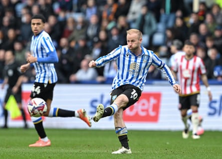 Sheffield Wednesday’s Barry Bannan passes the ball