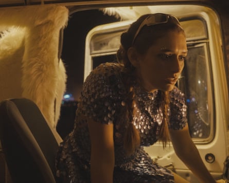 A woman inside a vehicle in a still from This is How the World Ends.