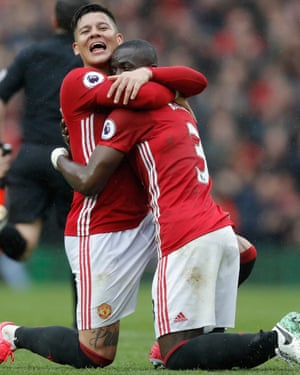 United’s Rojo and Bailly celebrate on final whistle.