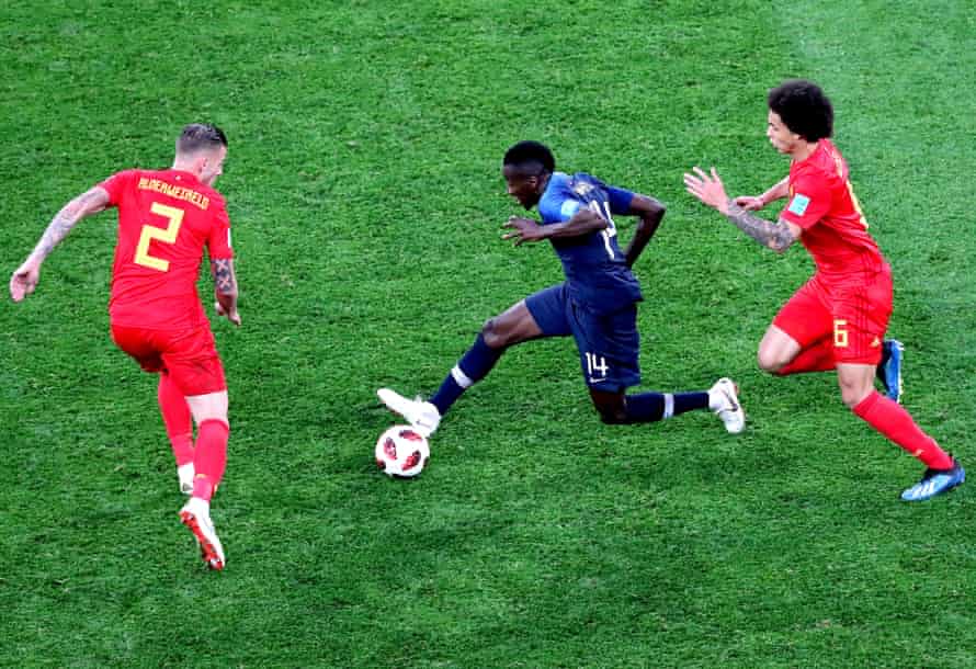 France’s Blaise Matuidi attempts to get the better of Belgium’s Toby Alderweireld and Axel Witsel.