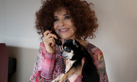 Fanny Ardant plus pooch in The Palace.